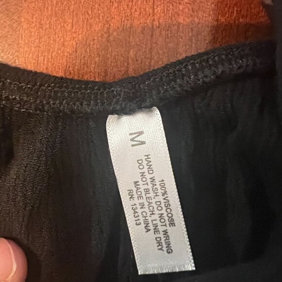 Black Sleeveless Ruffled Viscose Dress With Adjustable Straps & Tiered Hem - Picture 2 of 4